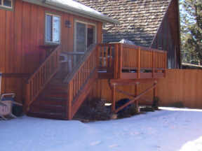 Back yard is fenced, protected from coyotes