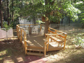 Deck built around Oak Tree in Big Bear Cabin